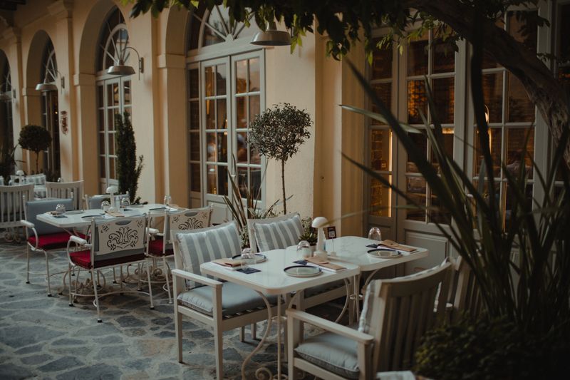 Relaxing outdoor patio dining area at Marcos Marco Island