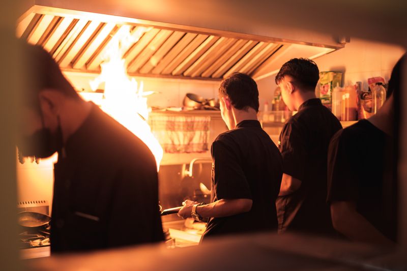 Marcos team collaborating in the kitchen for a busy service